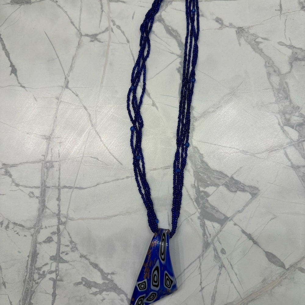 Bold Blue Multi-Strand Beaded Necklace with Artistic Pendant